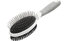 Double-sided dog brush with ergonomic handle, with metal pins on one side and soft bristles on the other for dual grooming.