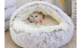 Slipper Pet Bed Slipper-shaped pet bed in grey with a fluffy interior, soft material, deluxe comfort and durable quality.