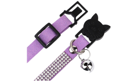 Luxury purple breakaway cat collar with crystals, adjustable and lightweight for comfort, with a purple bell attachment.