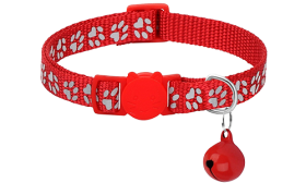 Red paw-patterned breakaway cat collar, adjustable and lightweight for comfort, safety buckle with matching bell.