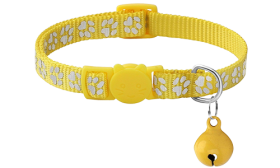 Yellow paw-patterned breakaway cat collar, adjustable and lightweight for comfort, safety buckle with matching bell.