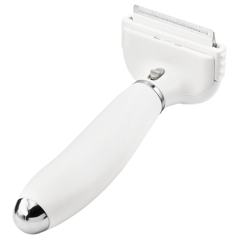 Small white deshedding brush for dogs with fine metal teeth and handle, to reduce shedding and remove loose fur.